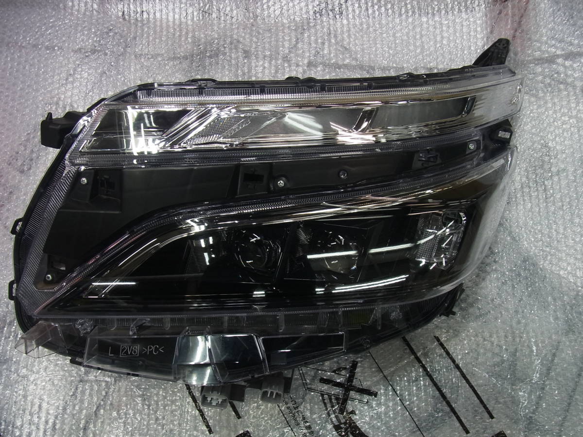 トヨタ 純正 ヴォクシーヴォクシー ZRR80/ZRR85/ZWR80 後期 左ヘッド