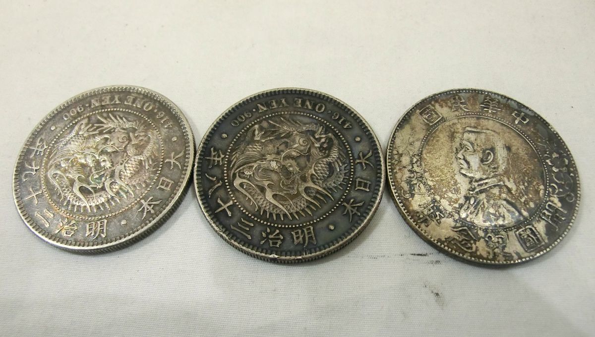 50銭銀貨 100円銀貨 50銭銀貨 100円銀貨 100円銀貨(1957