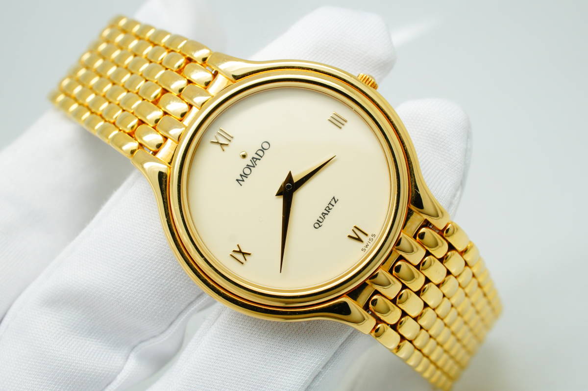 B100●作動良好 未使用デッドストック MOVADO モバード MUSEUM ミュージアム 87-33-866 ラウンド型 メンズ腕時計 ゴールド金 クォーツ