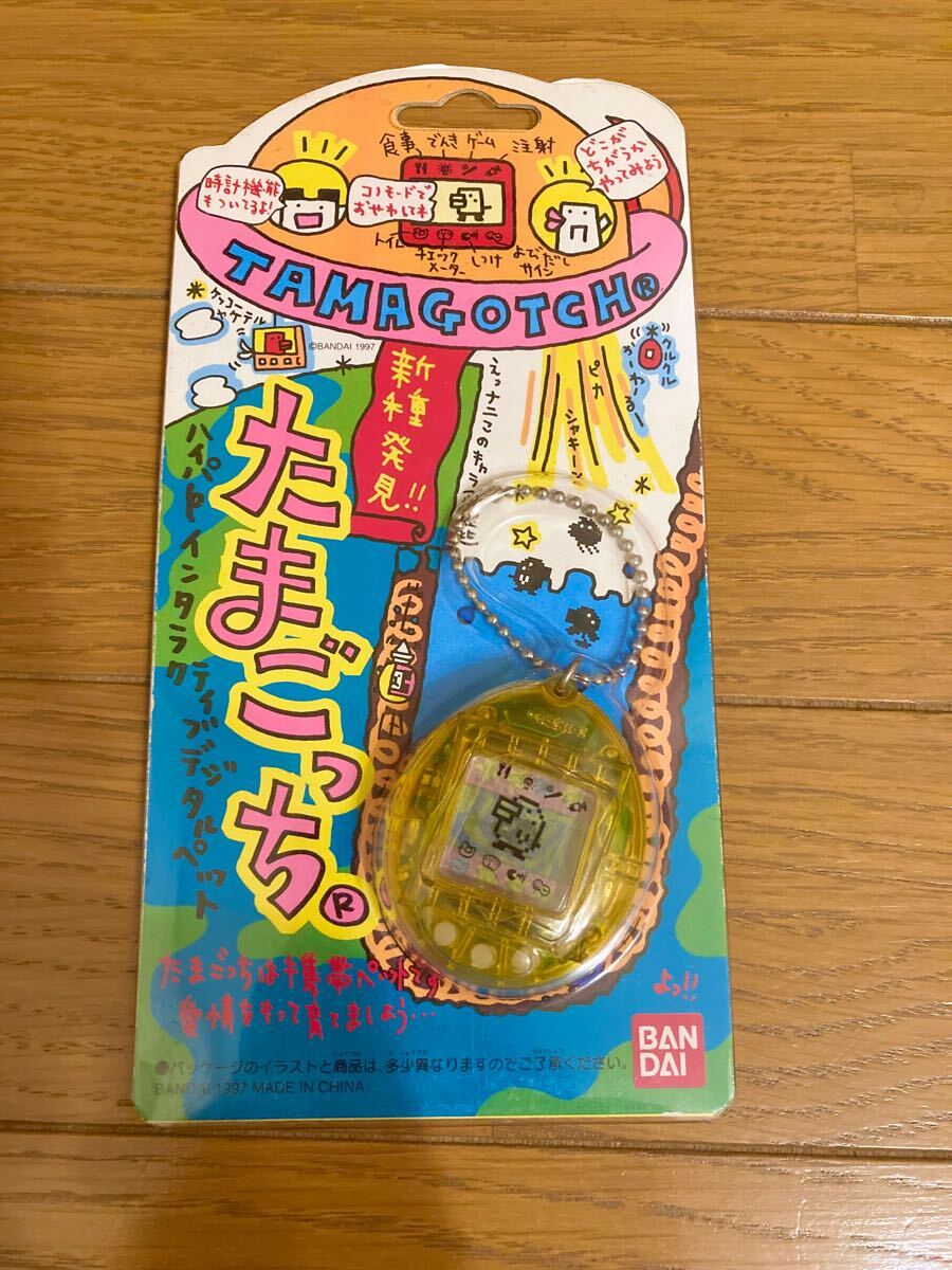 美品 動作確認済み 新種発見たまごっち 初代 スケルトン イエロー 箱