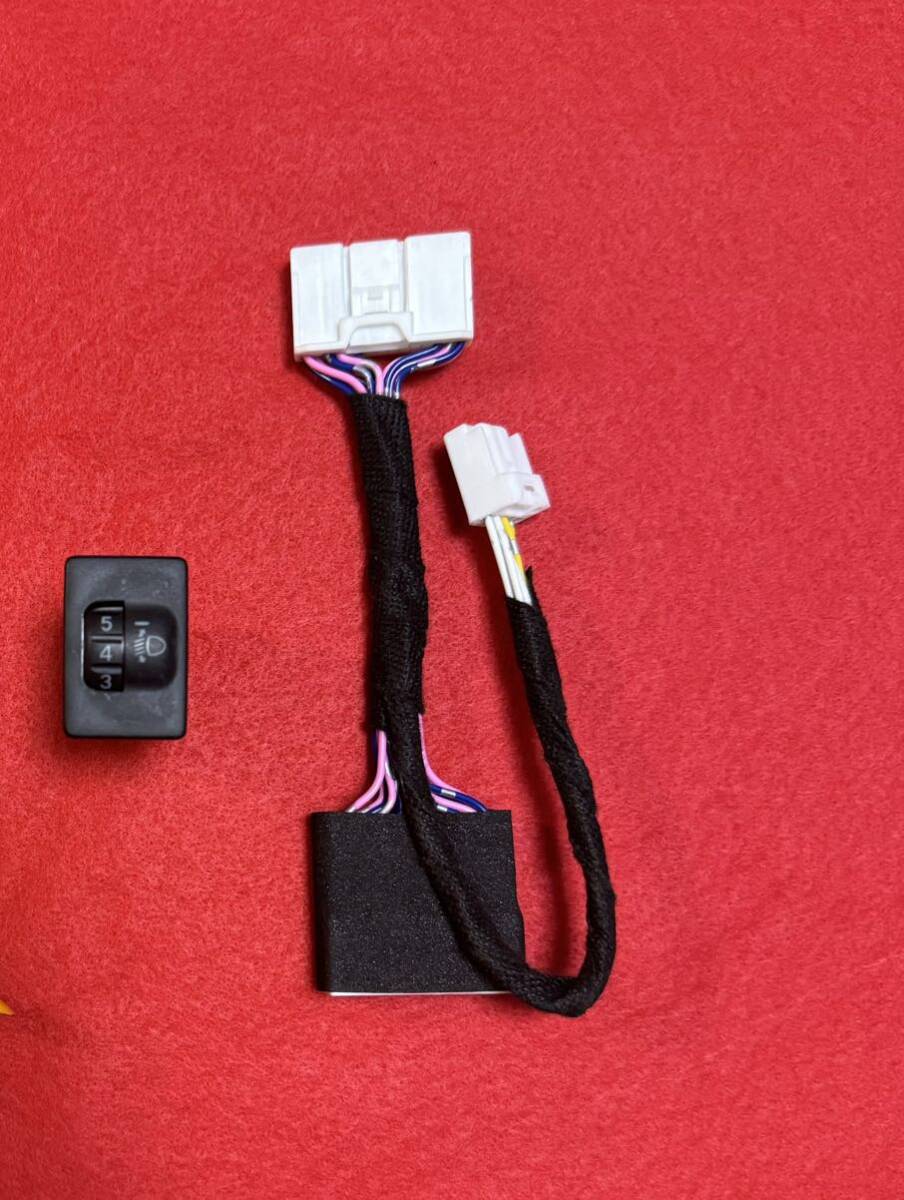 ハイラックス　ヘッドライト　レベライザー_1