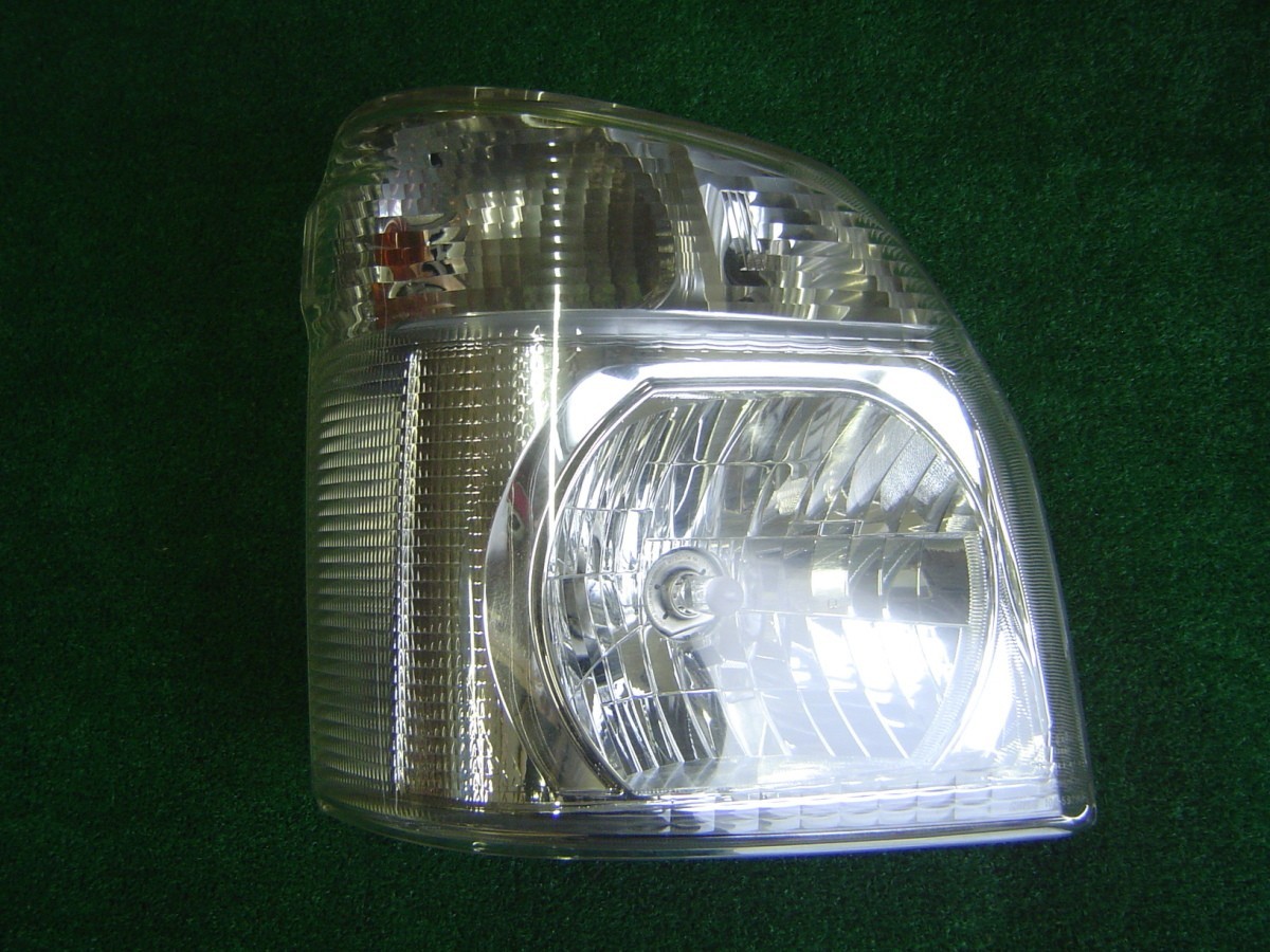 DG16T スクラム トラック 右ヘッドライト ハロゲン コイト：100-59296 マツダライト3