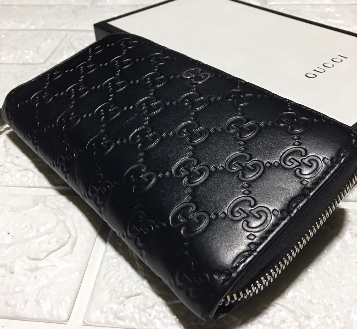 赤字超特価，新品 現行モデル／鑑定済みGUCCIシマGGラウンドジップ長財布／型番473928／ブラックレザー／価額93080円(男性用財布)｜売買されたオークション情報、yahooの商品情報をアーカイブ公開 - オークファン 服飾小物