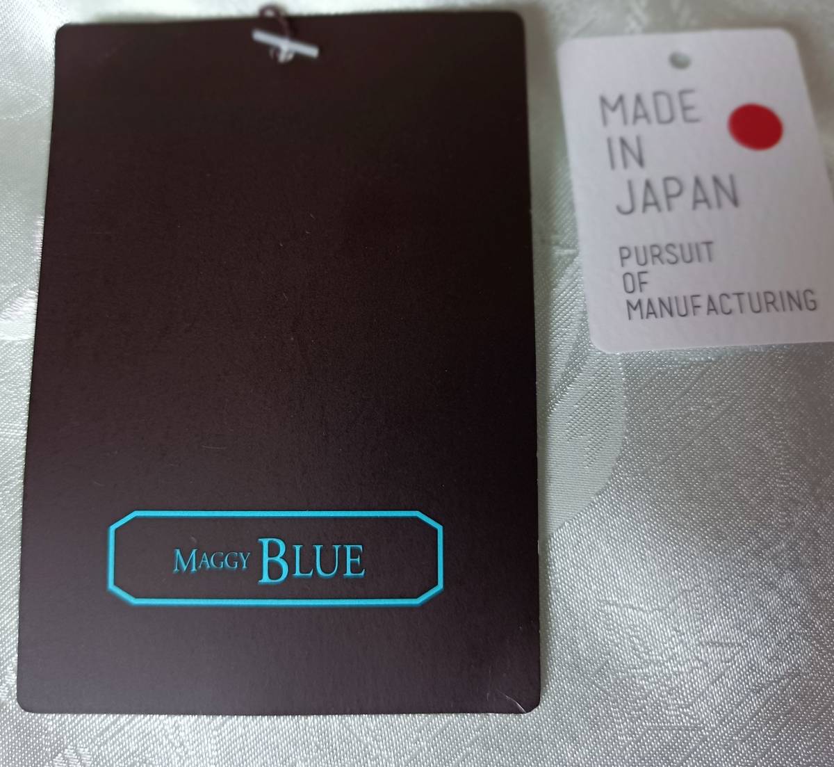 銀座マギー | - 公式通販 レディースファッション リボンベルト付き花柄配色ワンピース[pu84] ワンピース Maggi Mサイズ スカイブルーエメラルド花柄ワンピース マギー チャコールグレー 夏 WEB SHOP ベスト付花柄ワンピース
