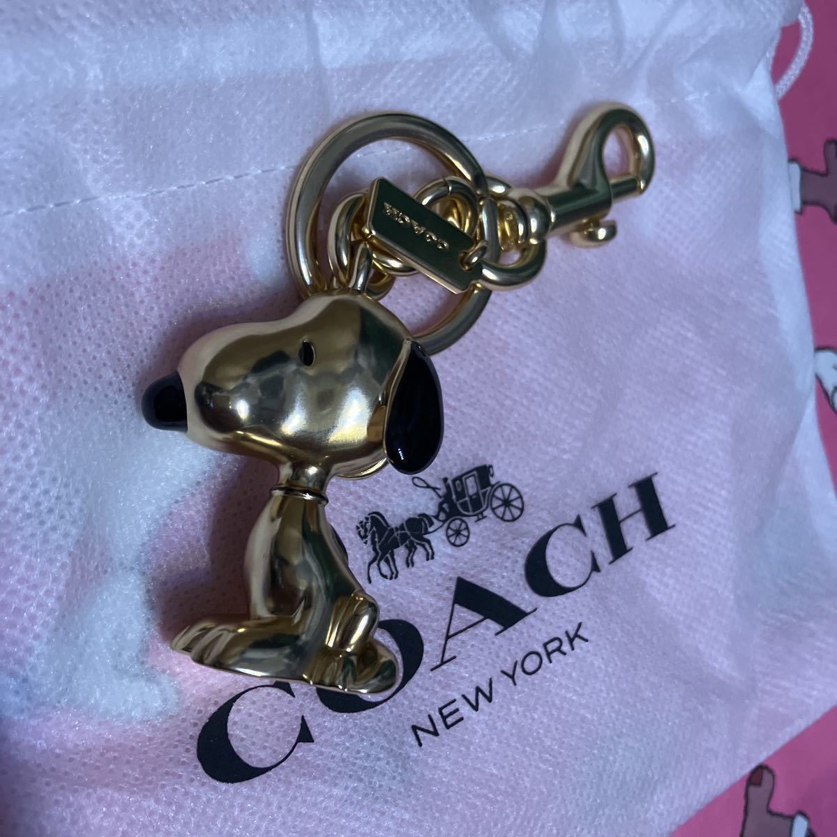 送料込専用袋付○新品○価22000 COACH X PEANUTS スヌーピー ゴールド