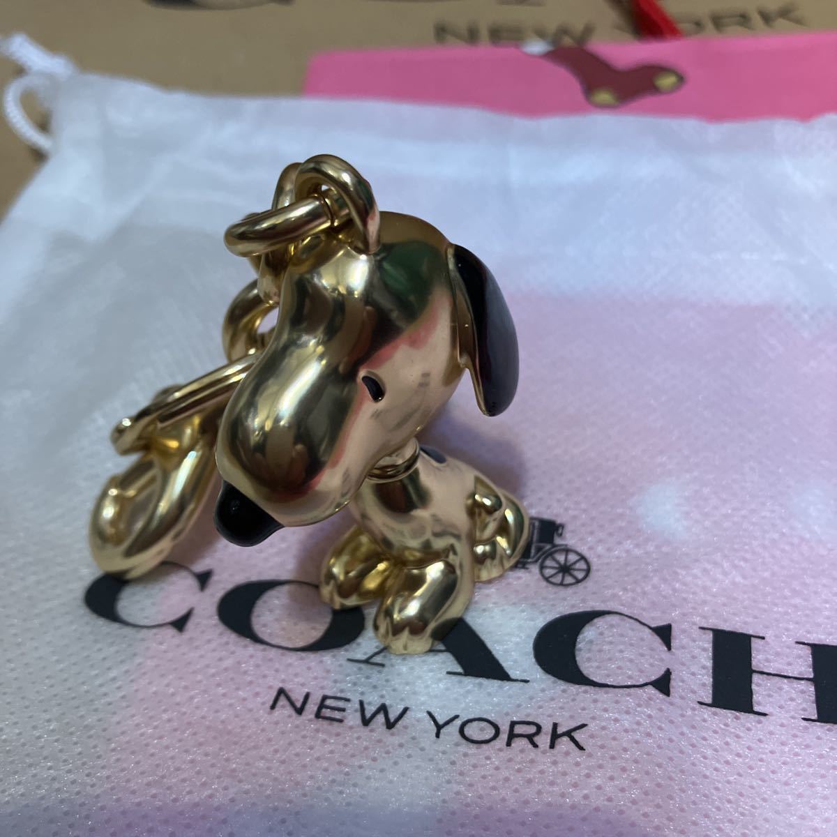 送料込専用袋付○新品○価22000 COACH X PEANUTS スヌーピー ゴールド