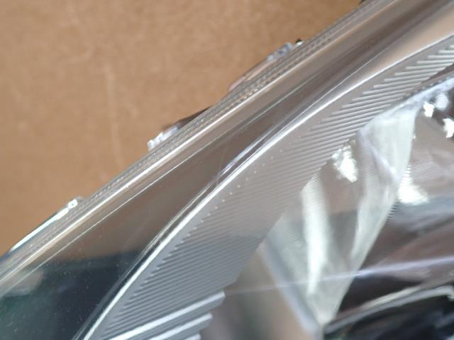 フィット DBA-GE6 左ヘッドライト/左ヘッドランプASSY L13A NH700M