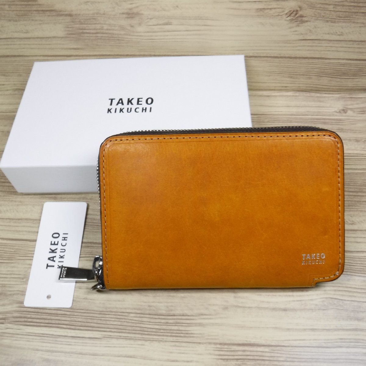 QQ871 タケオキクチ 定価17600円 ラウンドファスナーセミ長財布 イタリア牛革 ウォレット 箱付新品 キャメル 780604 TAKEO KIKUCHI