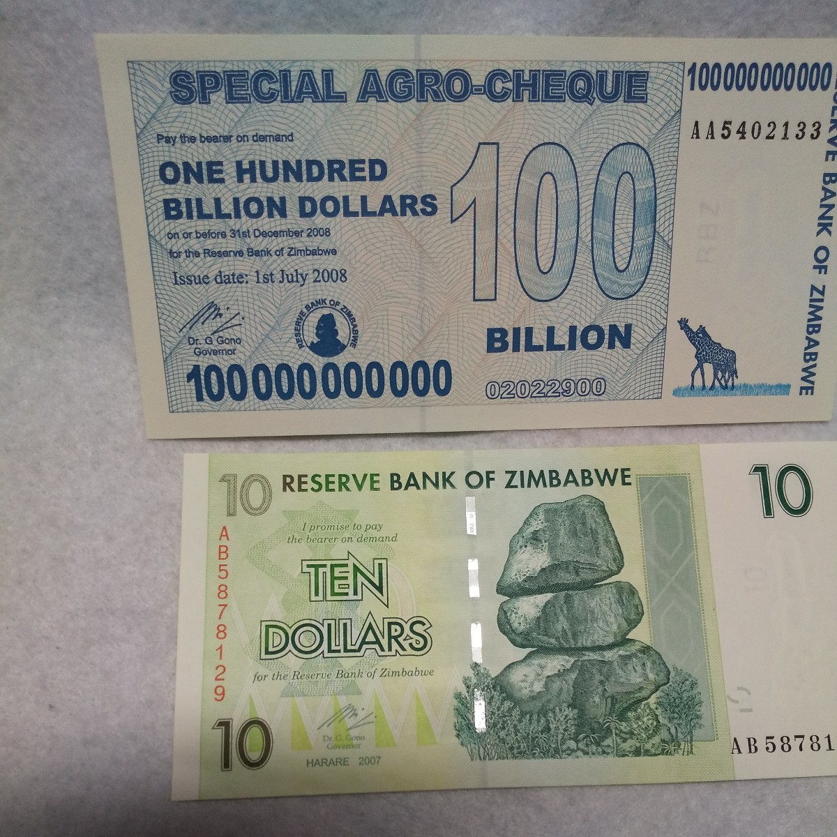 ジンバブエ 1000億ドル と デノミ後の10ドル紙幣 セット ハイパー 