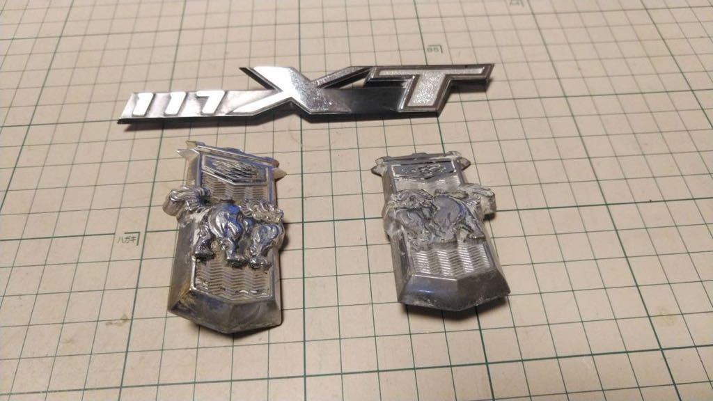 117クーペ エンブレム XT