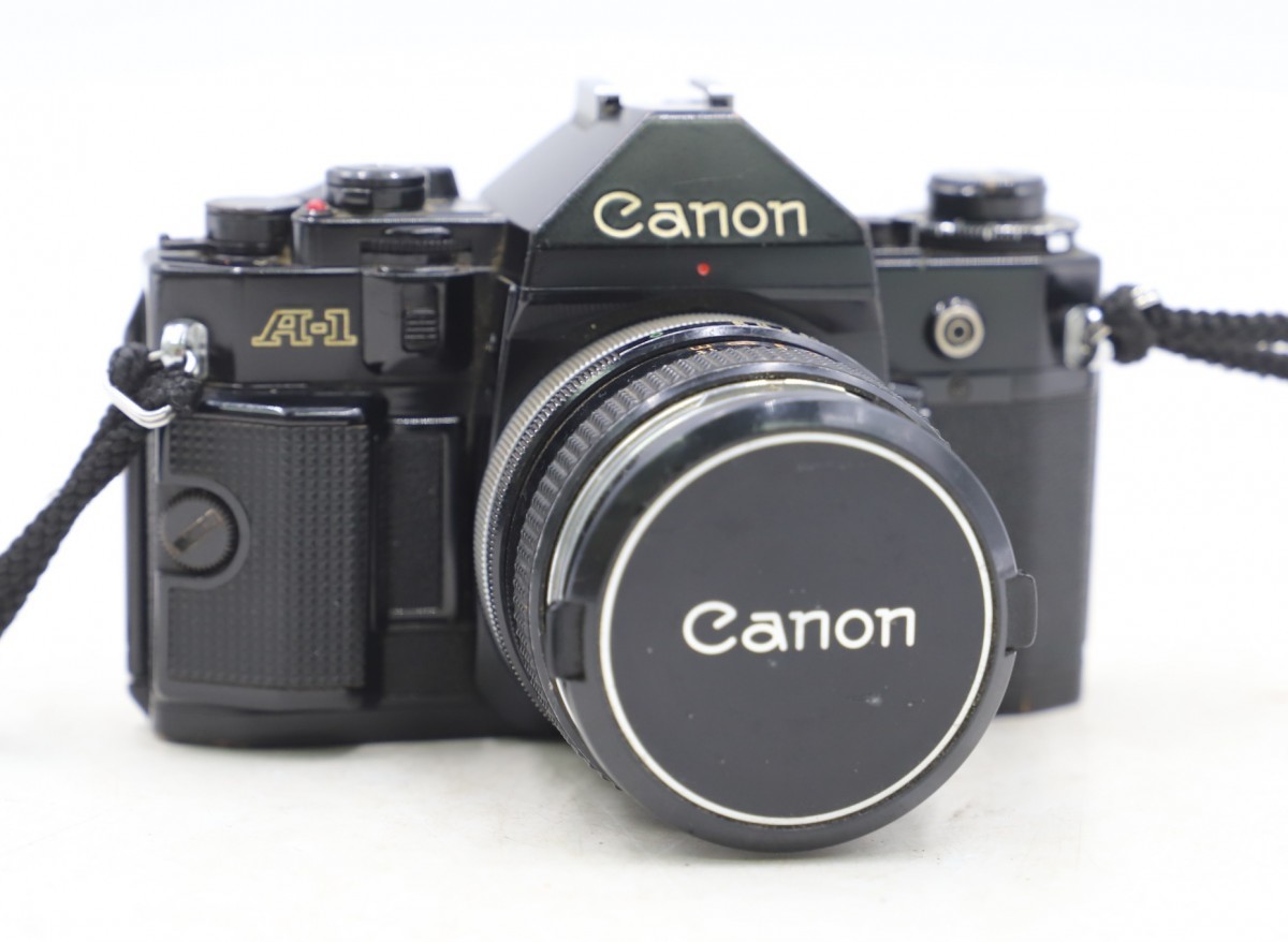□A Canon A-1 ボディ LENS FD 28mm F2.8 レンズ シャッター、露出計OK