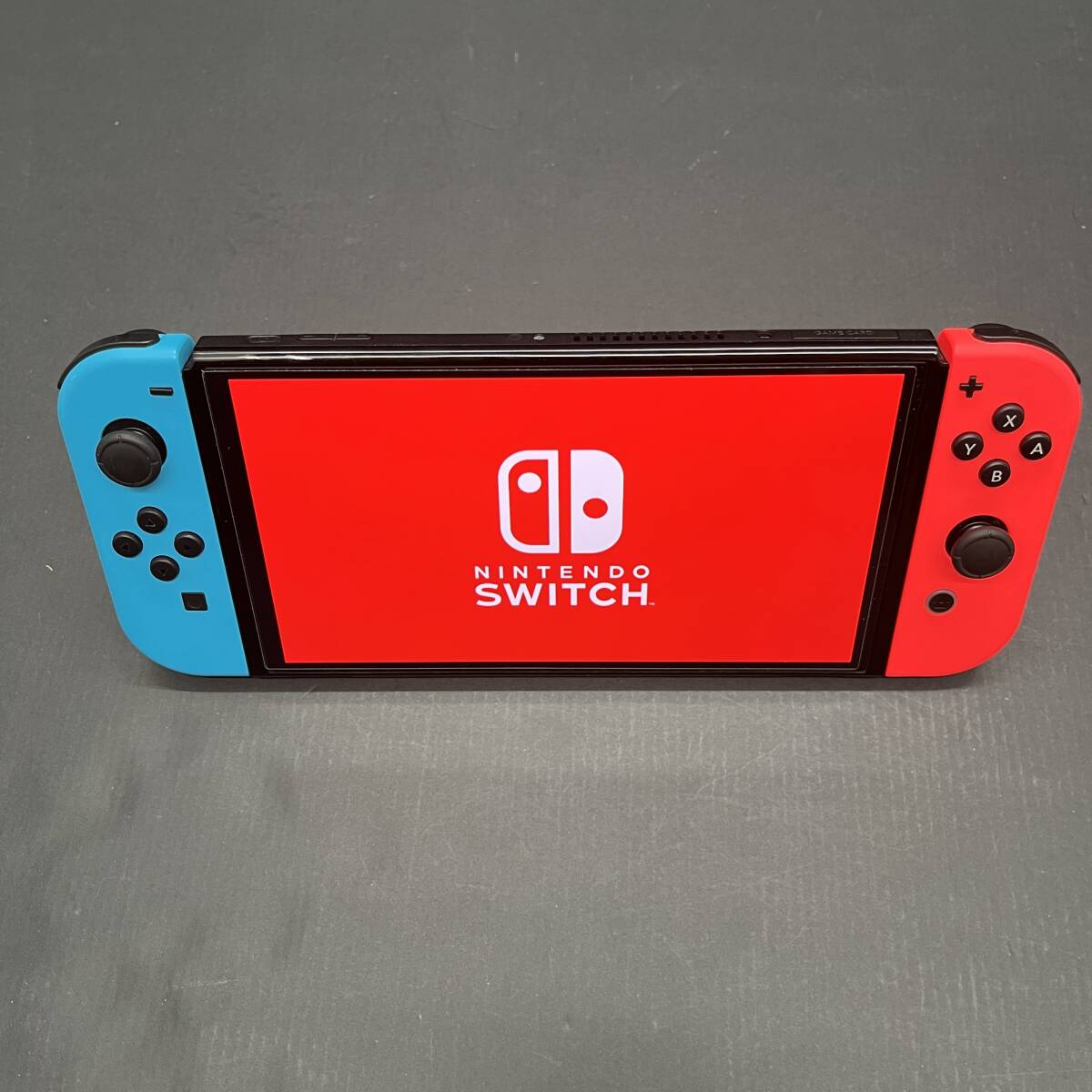 06W11199 ☆1円～ Nintendo スイッチ 有機ELモデル ネオンブルー