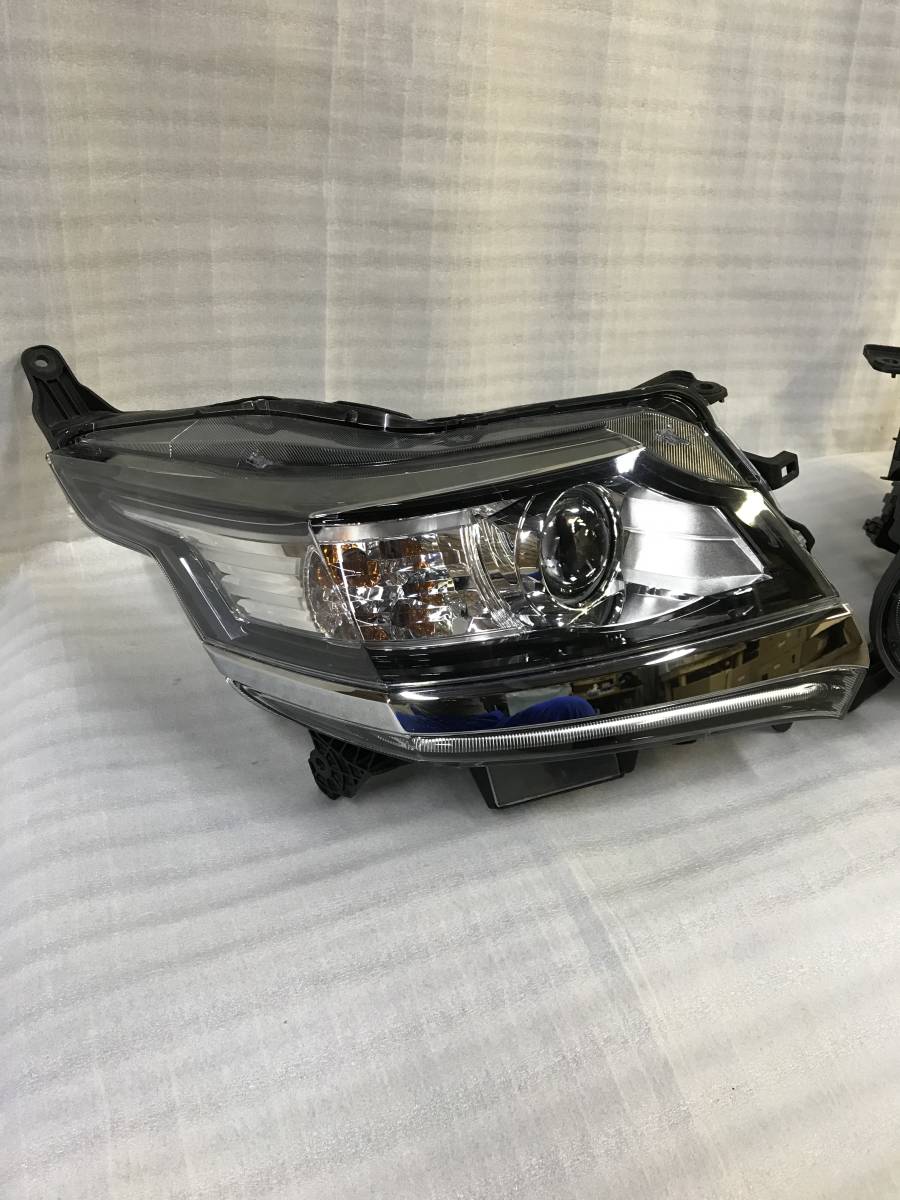 ヴェルファイア純正LH（左側） ICHIKOH 58-23ヘッドランプ中古品