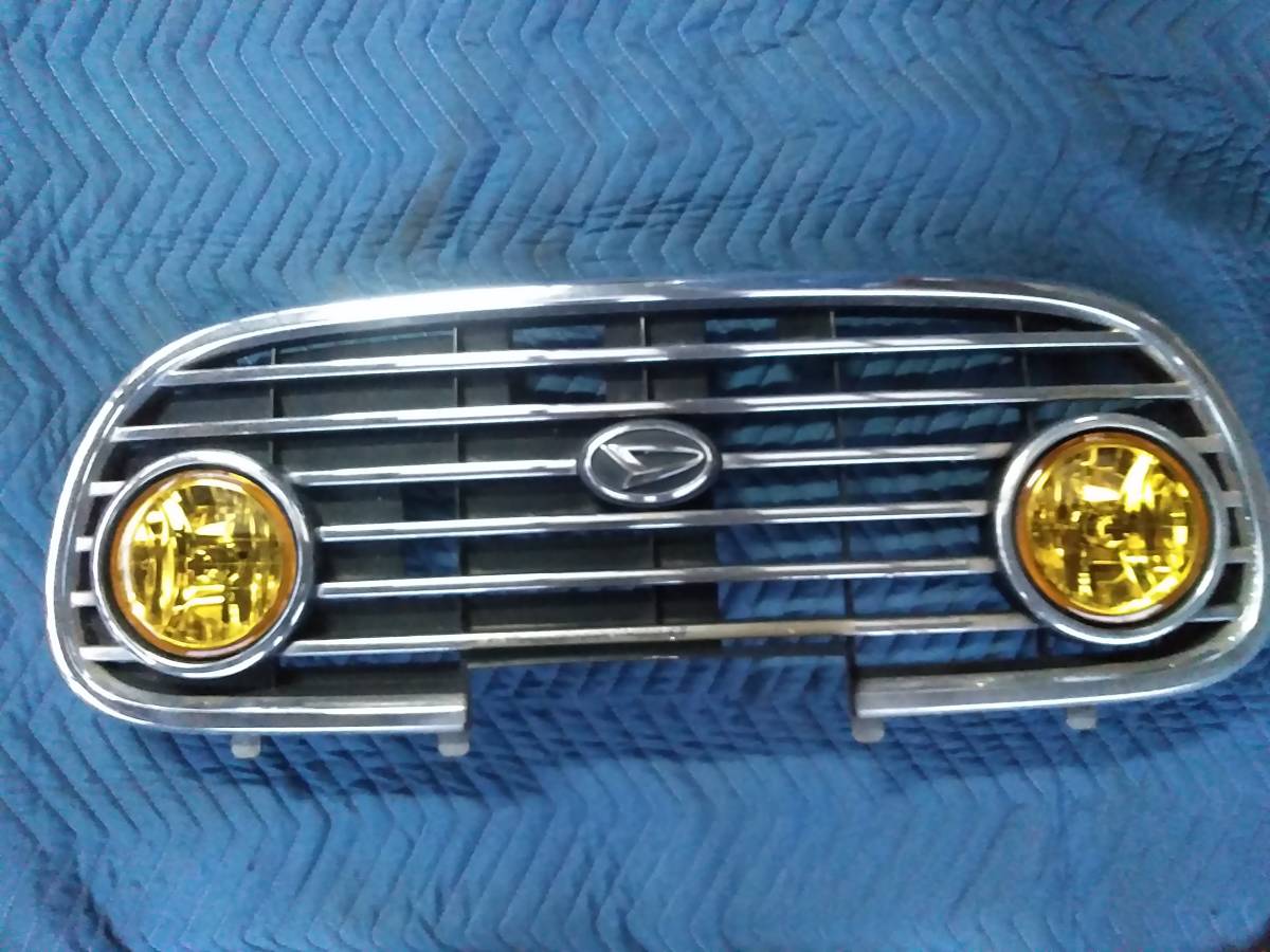 ミラジーノ L700S ダイハツ 純正 グリル フロントグリル イエロー