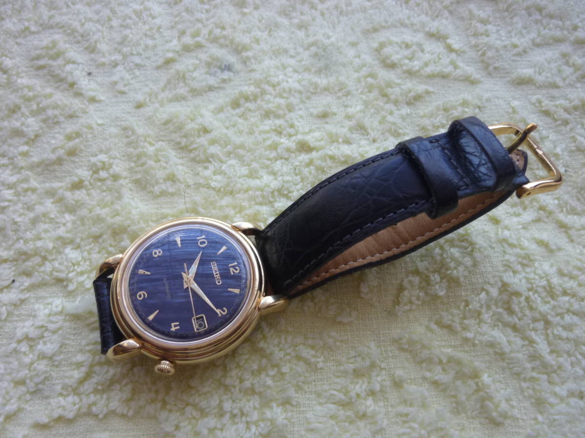 セイコー メンズ 自動巻き 7002‐8010 黒文字盤 金色モデル