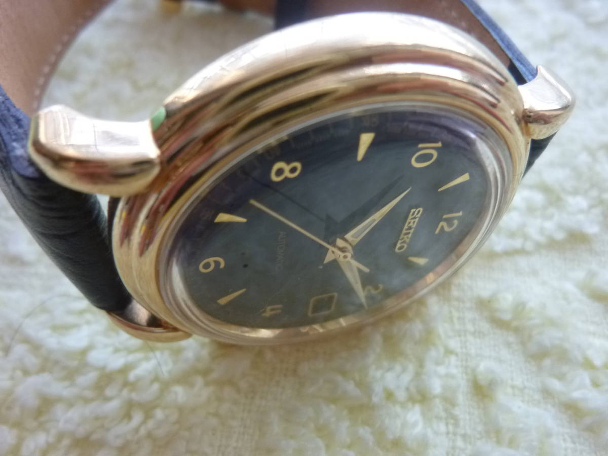 セイコー メンズ 自動巻き 7002‐8010 黒文字盤 金色モデル