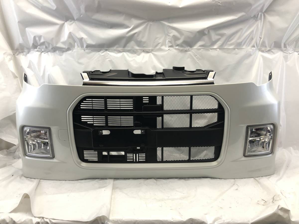 100配達条件ありB18 ダイハツ　タントエグゼ カスタム L455S フロントバンパー フォグ付き W24　パール 白