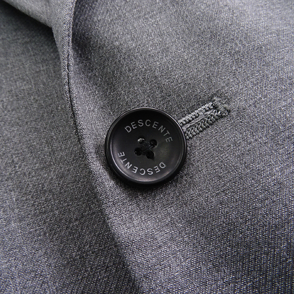 DESCENTE 高ストレッチ セットアップ ロゴ刻印ボタン メランジネイビー DESCENTE 高ストレッチ セットアップ ロゴ刻印ボタン メランジネイビー