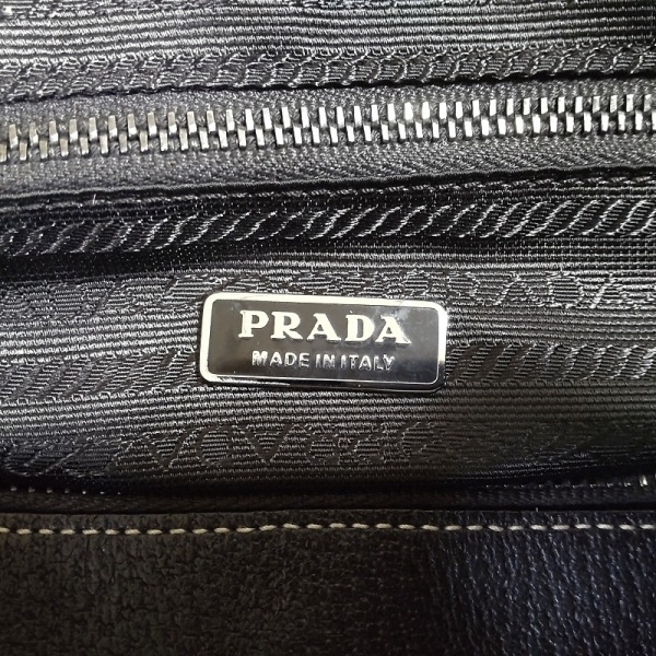 プラダ PRADA ハンドバッグ - レザー ダークブラウン バッグ PRADA ダークブラウン プラダ メルカリ 革タグ ハンドバッグ(レディース