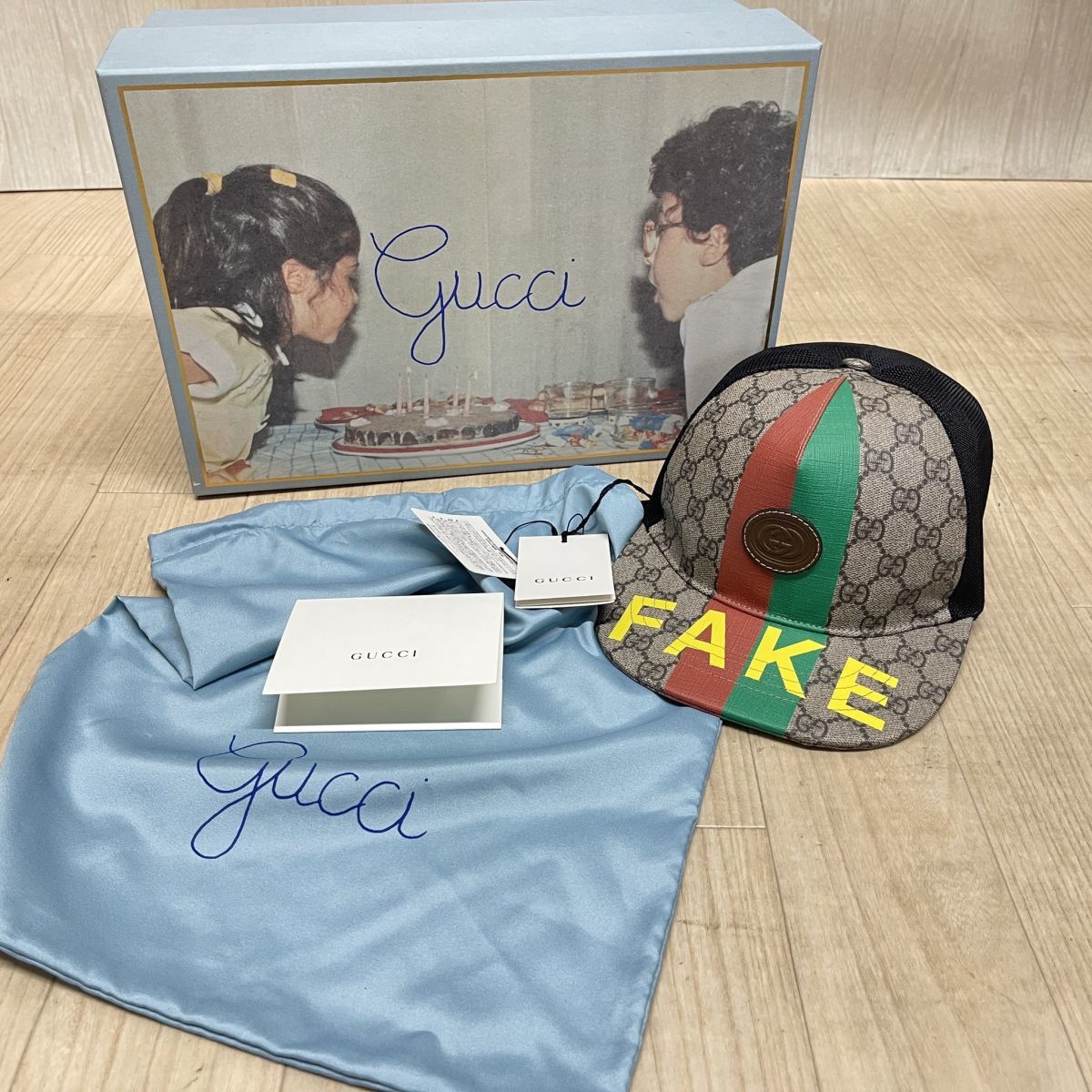 P112-I34-2292 未使用 GUCCI グッチ GGロゴ NOTFAKE キャップ サイズM 