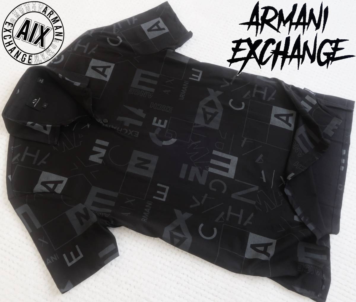 新品★アルマーニ★総柄 ブラック ポロシャツ★全面 グレー ロゴプリント★半袖 ニットシャツ 黒 XL★A/X ARMANI★460