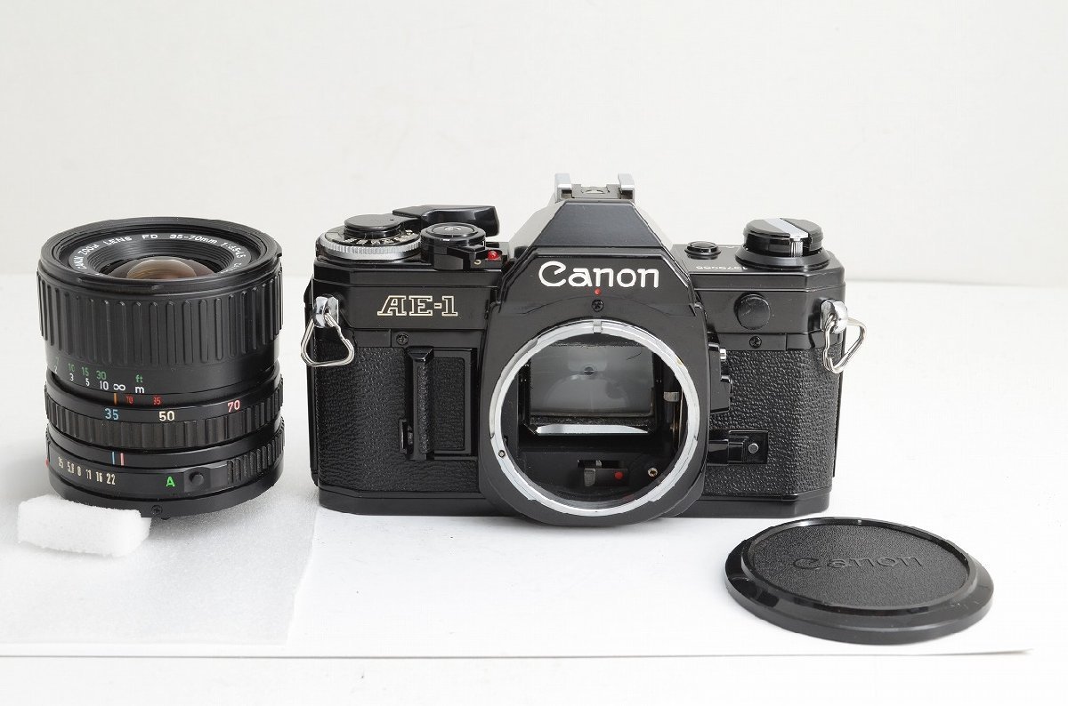 アルプスカメラ】 ジャンク品 Canon キヤノン AE-1 + NEW FD 35-70mm