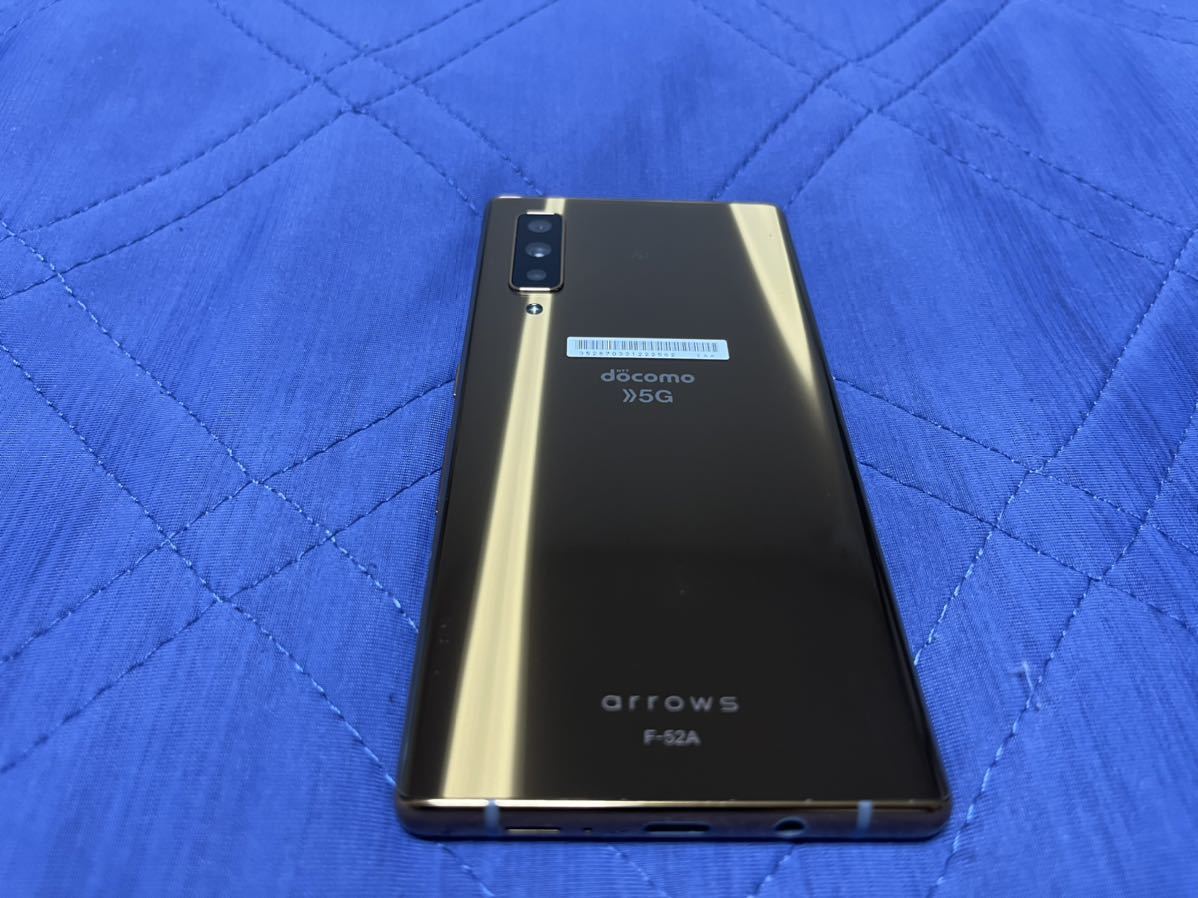 美品】【SIMロック解除炭】arrows NX9 F-52A ゴールド docomo ドコモ