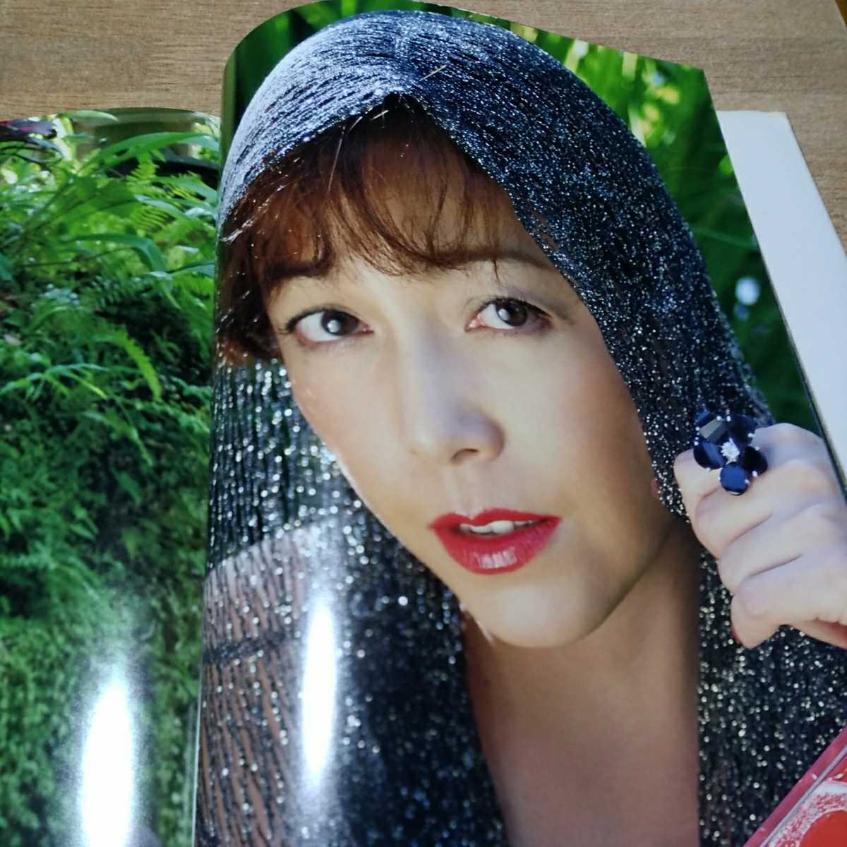 柏原芳恵写真集101%初版中古品になります。撮影：佐藤健。2003年10月10  