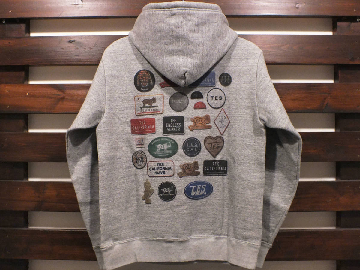 新品 Lサイズ TES エンドレスサマー カリフォルニア ワッペン グラフィック パーカ グレー The Endless Summer WAPPEN GRAPHIC PARKA