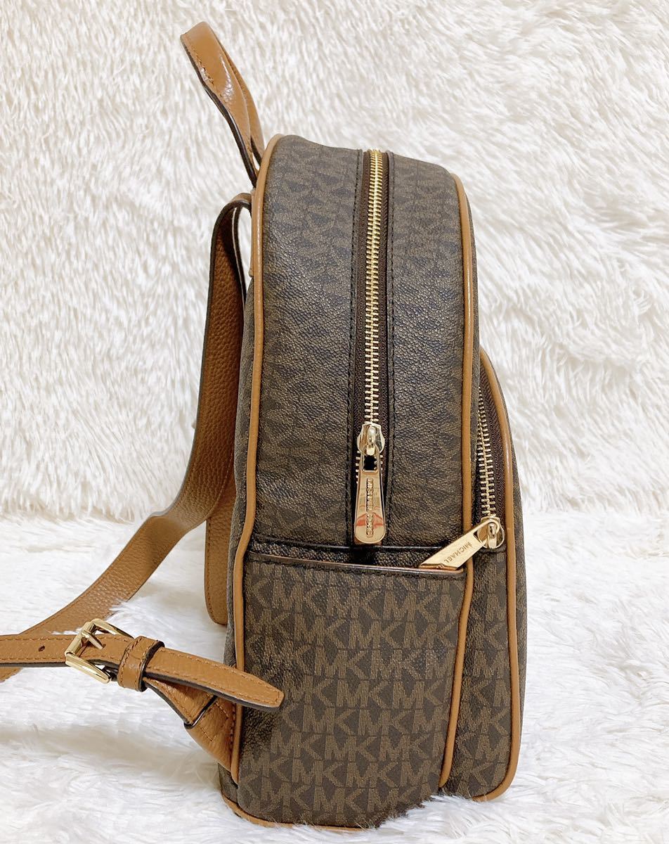 【美品】 MICHAEL KORS リュック ブラウン 美品MICHAEL KORS マイケルコース リュック ブラウン ロゴ押し
