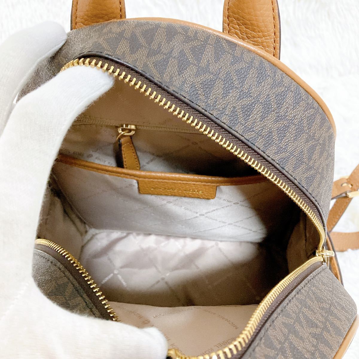 美品MICHAEL KORS マイケルコース リュック ブラウン ロゴ押し