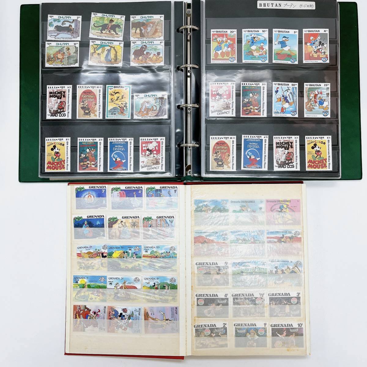 N：【ディズニー切手】アルバム2冊 未使用 消印あり 混合 まとめて1052枚 切手美品 / ディズニーキャラクター バラ 切手 外国切手 