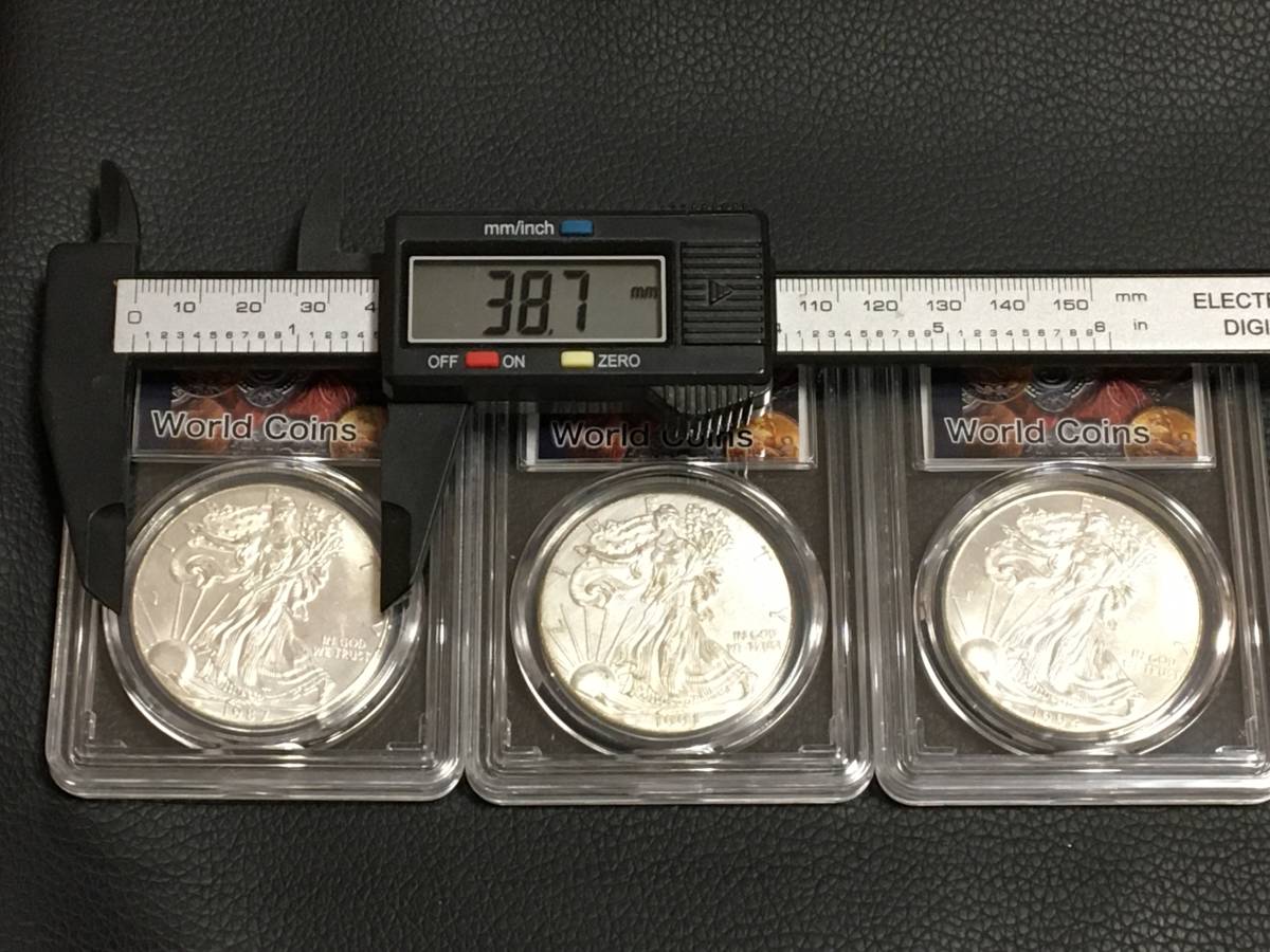 SK59)外国貨幣　イーグル1オンス銀貨コイン、メダル3枚ケース入り(1987，191，1994)