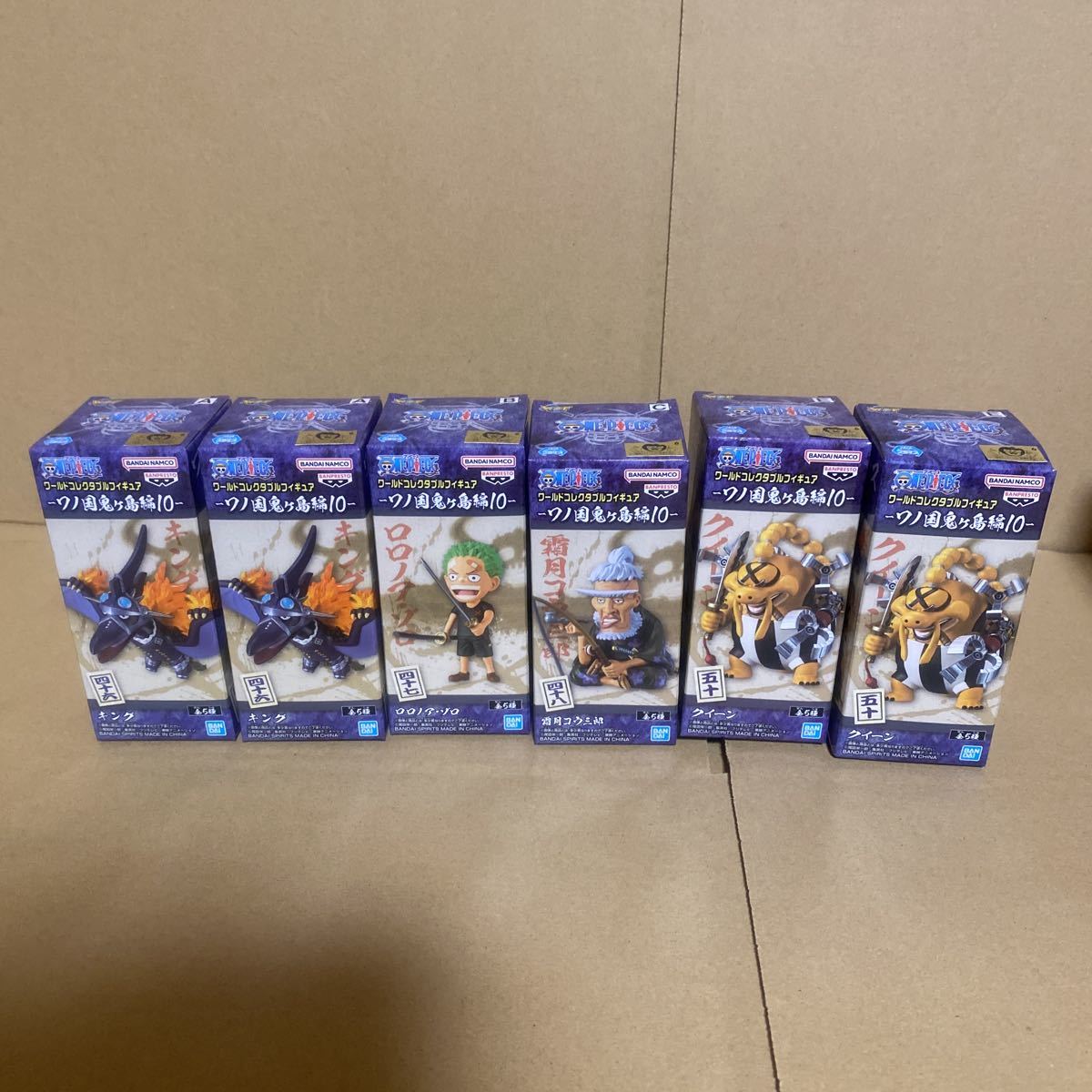a.e【未開封】6個　ワンピース ワールドコレクタブルフィギュア ワノ国鬼ヶ島編10 キング　ロロノア・ゾロ　霜月コウ三郎 クイーン A B C E