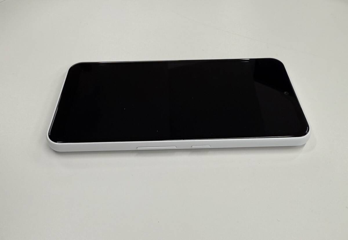 arrows We FCG01 ホワイト au 判定〇_3