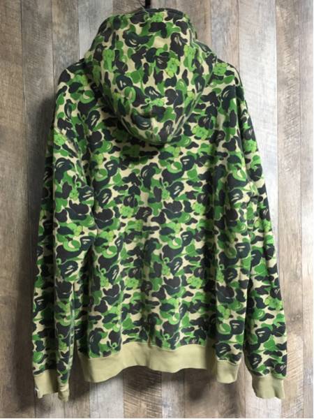 A BATHING APE × KAWS カモフラジップパーカー A Bathing Ape × KAWS カモフラ パーカー XL カモ BAPE 1st あ