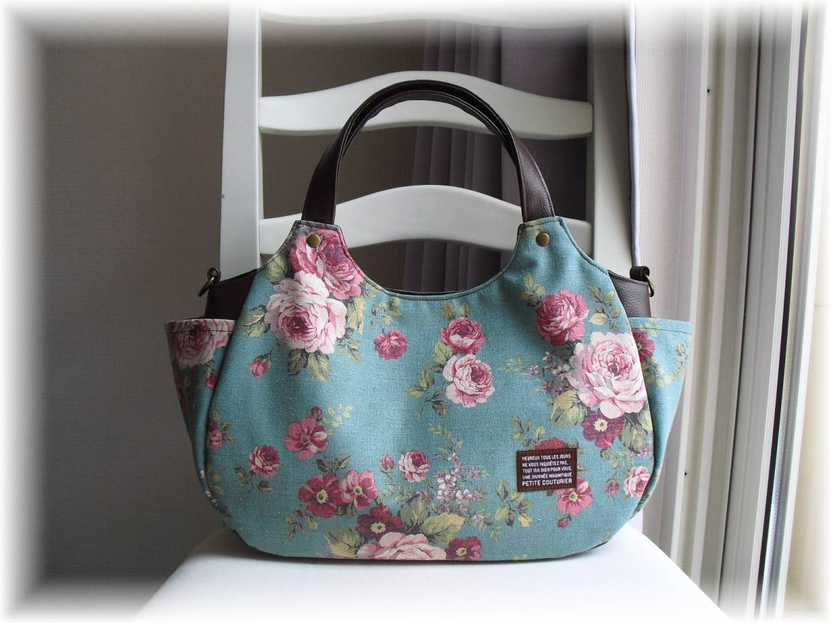 ◇手刺繍◇ボタニカル柄◇リネン◇コロリンバッグ◇ショルダーベルト付