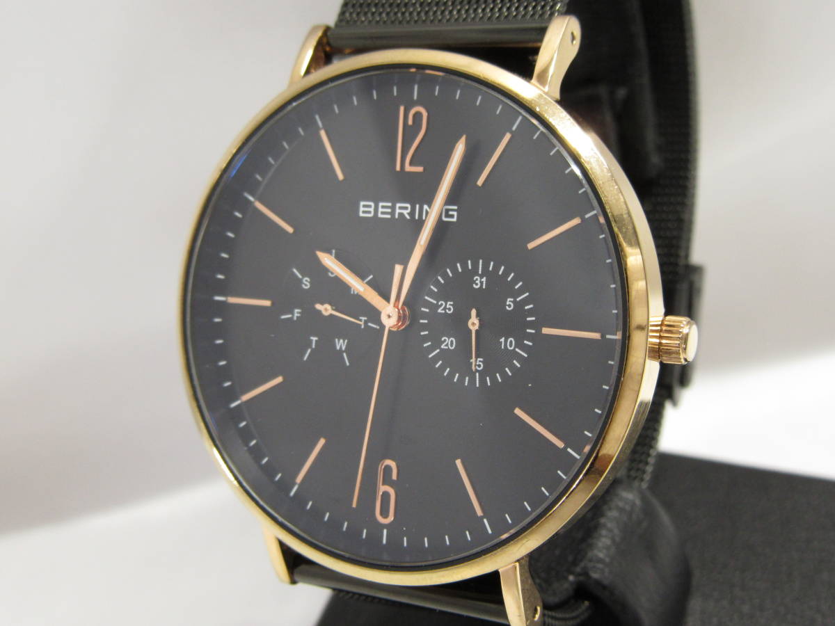 BERING ゴールド×ブラック メンズ腕時計 中古品 西1-21A BERING 腕時計 