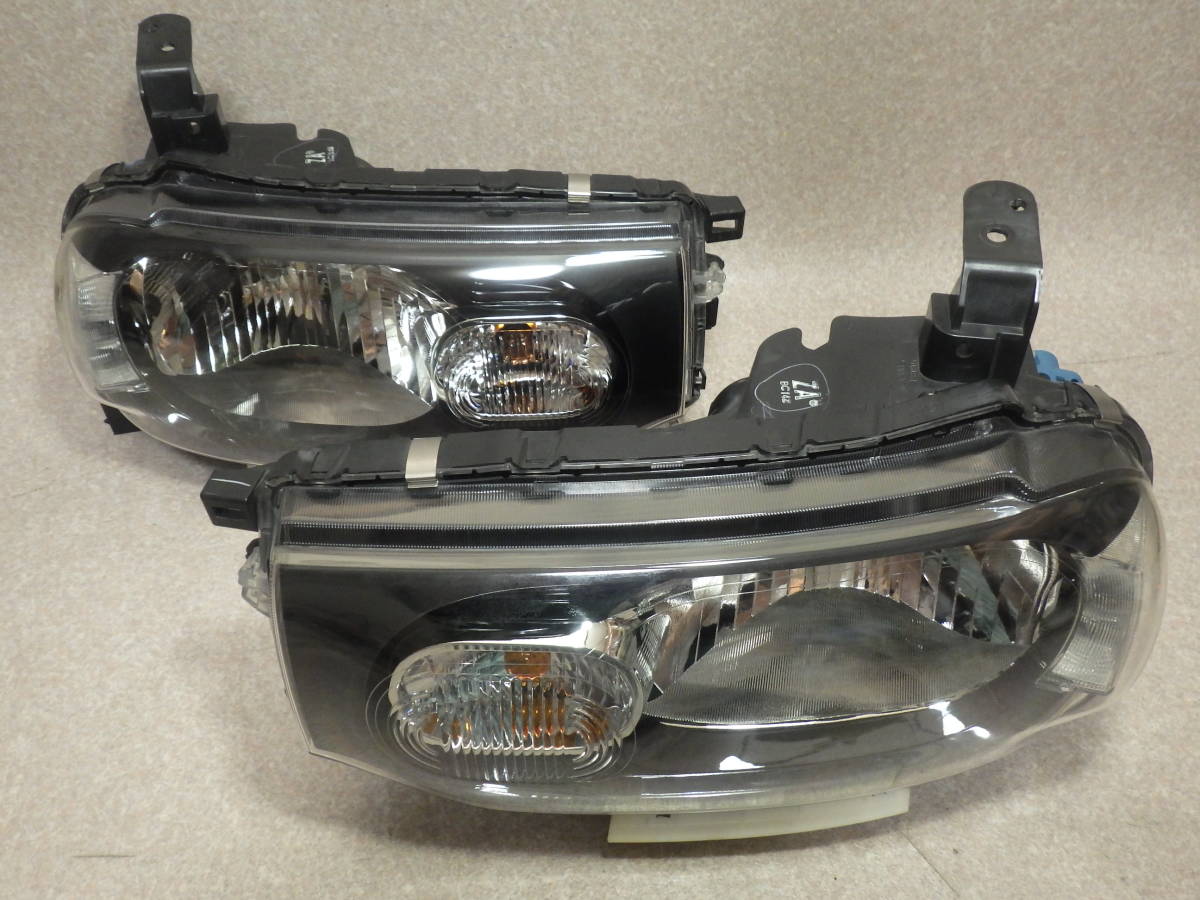 キューブ Z12 ヘッドライト 左右セット STANLEY P8190 ハロゲン式 レべ