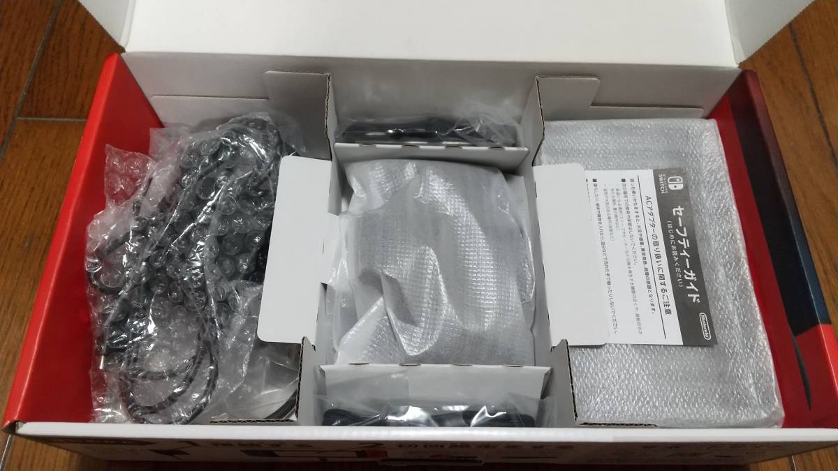 新型 Nintendo Switch ニンテンドースイッチ 本体　ネオンレッド ネオンブルー　中古　スマブラ　ファミスタエボリューションソフト付き　_8