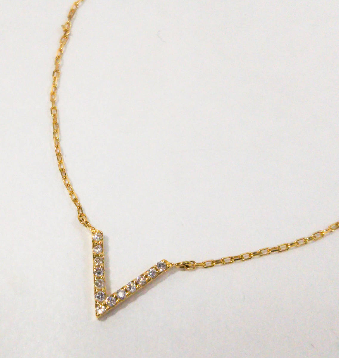 【極美品】エテ K18YG ダイヤモンド0.03ct パーティクルトライアングルネックレス 40cm 付属品なし 総重量約1.1g 参考価格:41.800円 ete
