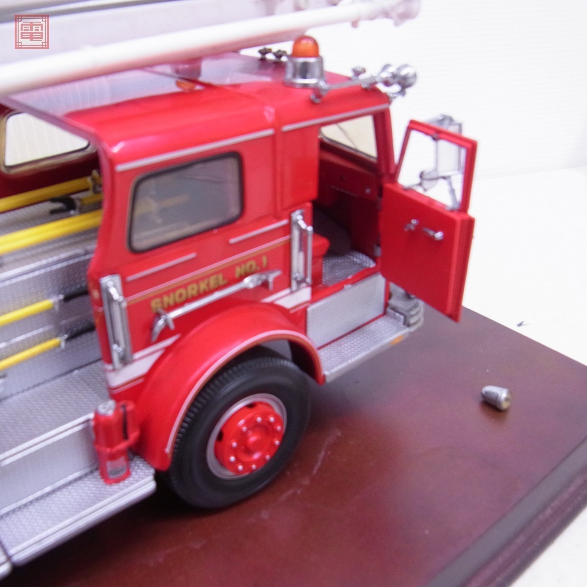 Three Franklin Mint Precision fire engine model vehicles comprising a Pierce Snorkel fire engine, a