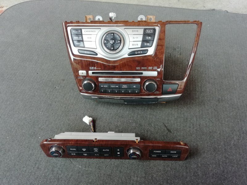 H19 エルグランド NE51 E51 ナビユニット ウッドパネル 25915 WB30A