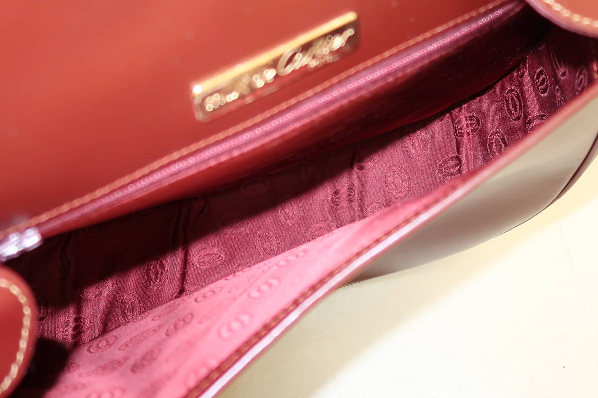 1円〜Cartier カルティエ マストライン レザー 巾着型