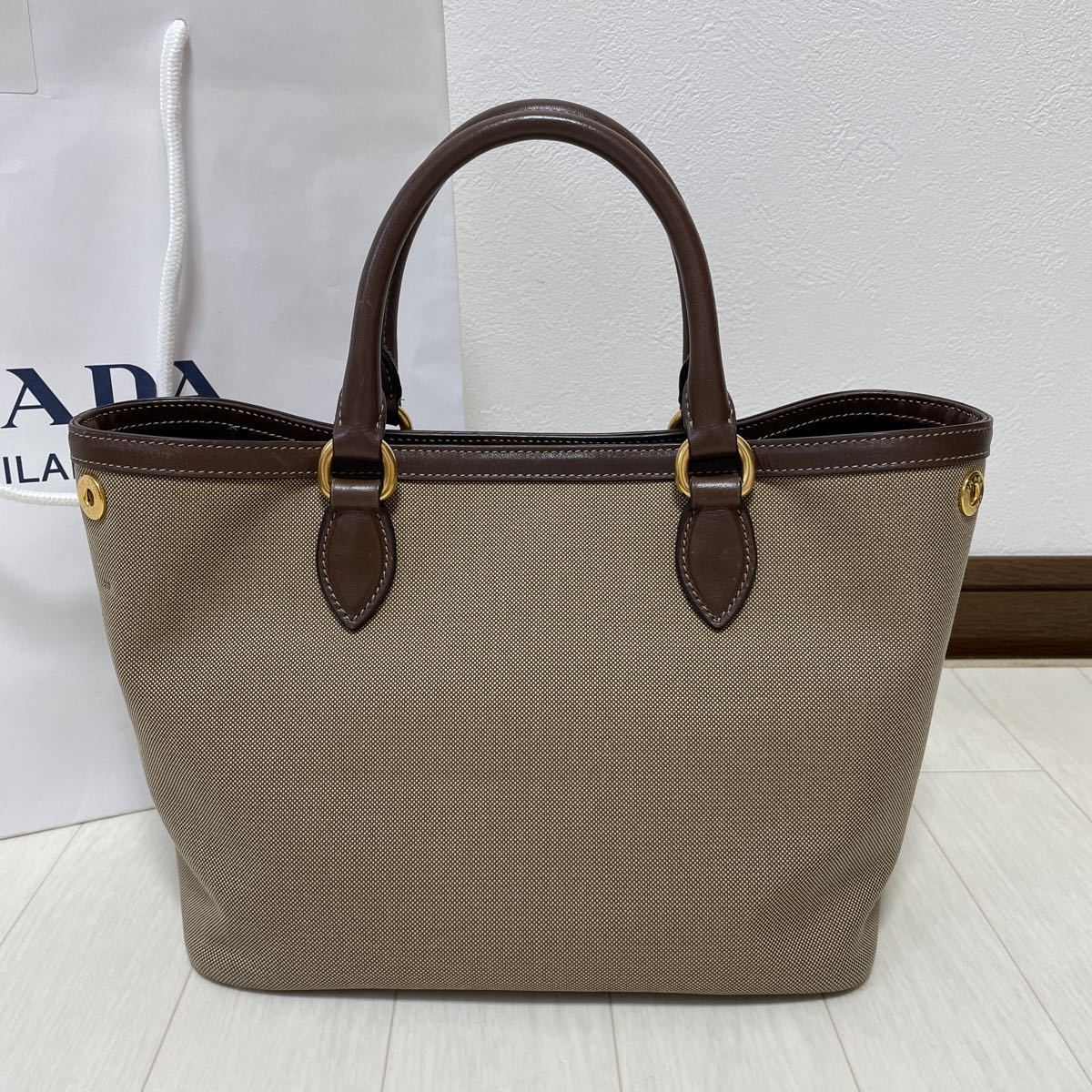 PRADA】トートバッグ ロゴジャガード キャンバス ブラウン 【公式通販】