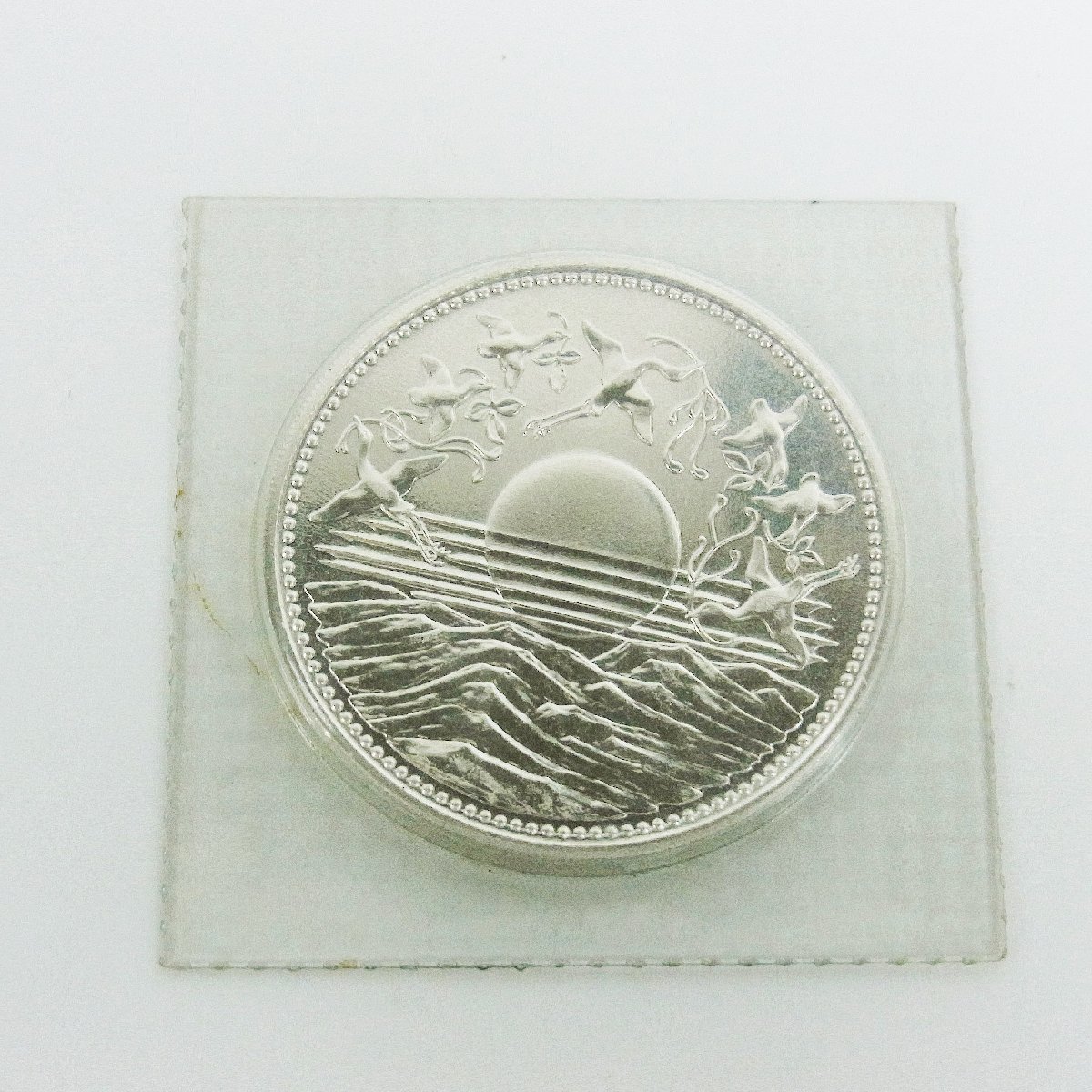 天皇陛下御在位60年記念貨幣 1万円プルーフ銀貨ブリスターパック入り