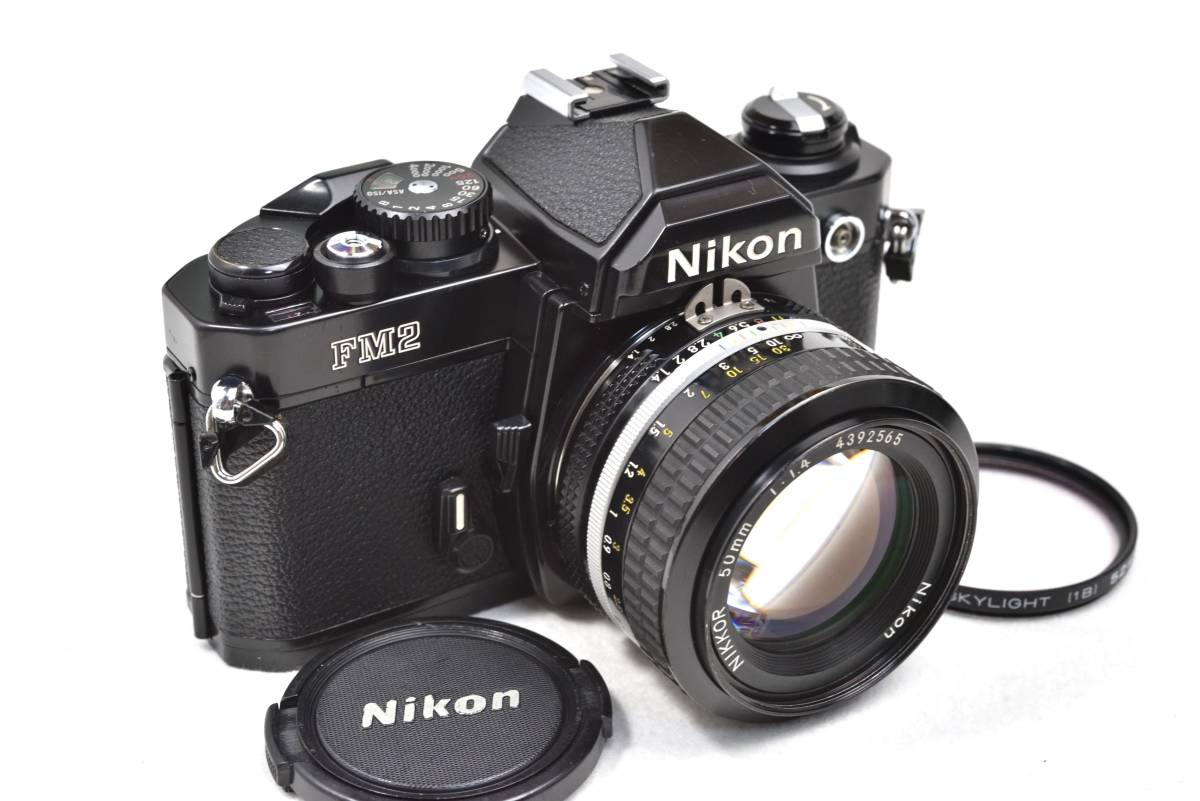 【きれいな動作品】Nikon ニコン New FM2ブラック前期型＋NIKKOR Ai 50㎜ f1.4　 清掃・整備済でさらに電池付き！！