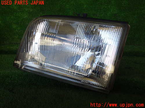 1UPJ-25471132]ビッグホーン(UBS73GW)左ヘッドライト ハロゲン