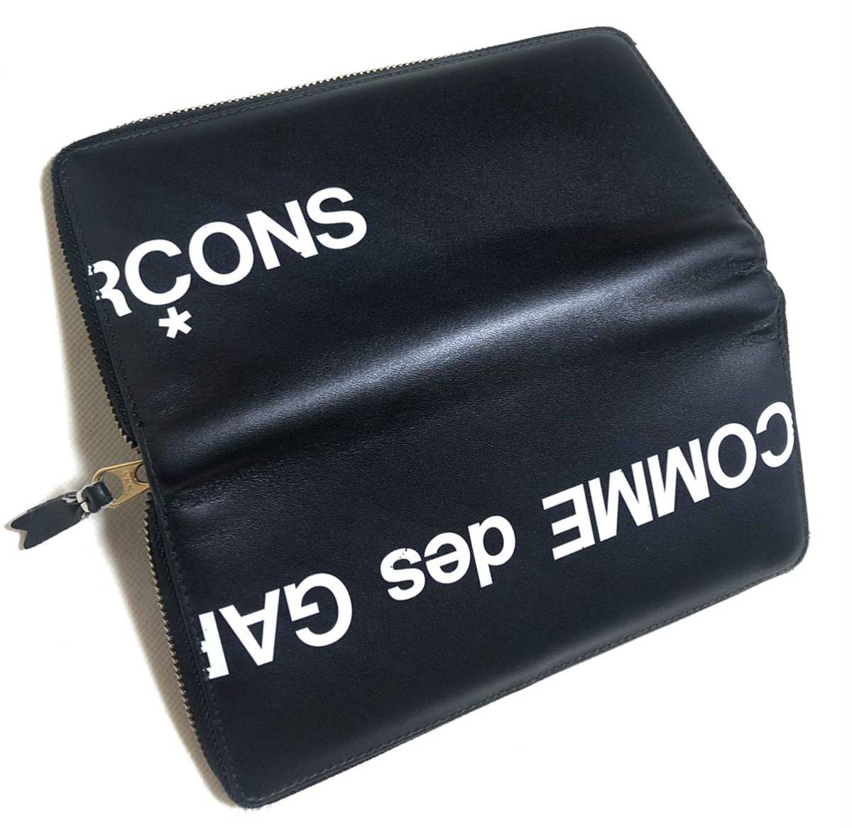 COMME des GARCONS コムデギャルソン ヒュージロゴ ラウンドジップ