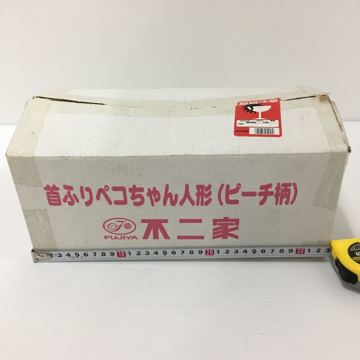 首ふりペコちゃん人形　(ピーチ柄)　 桃　非売品　ペコちゃん人形　首振り　貴重 2009年　当選品 首振りペコちゃん人形（ピーチ柄）\"ペコちゃんオリジナルグッズ 不二家 ⭐︎不二家 ペコちゃん首振り人形 1960年代 ペコ